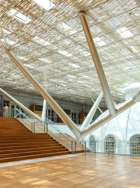 National Gallery Singapore architecture with modern ceiling and dome structure.