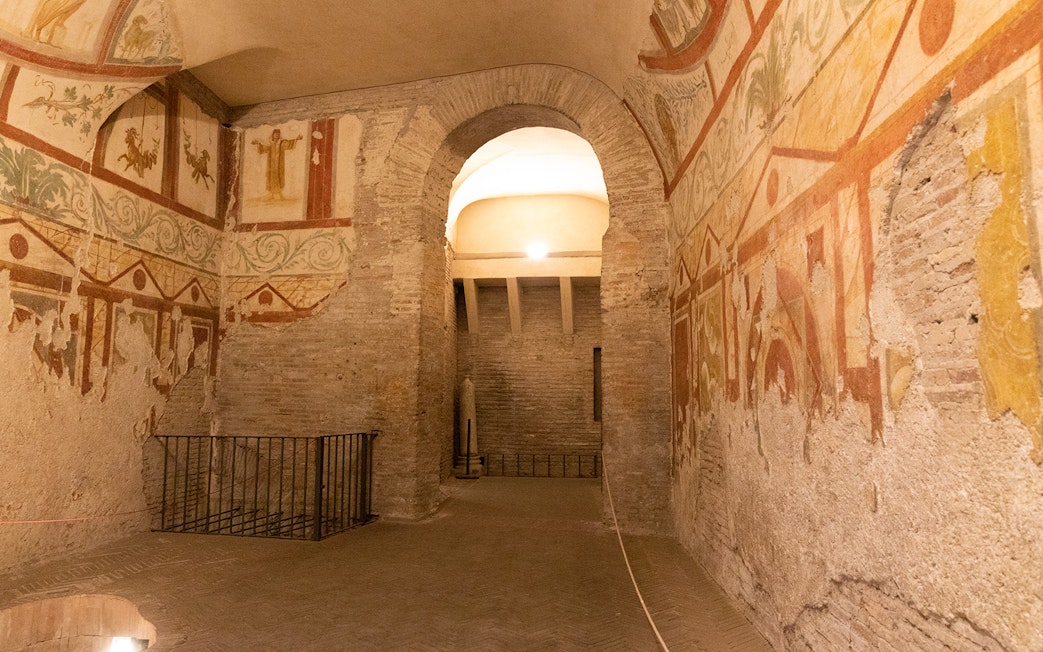Underground catacombs with ancient frescoes on a guided tour with transfers.