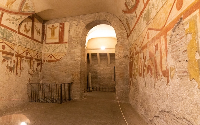 Underground catacombs with ancient frescoes on a guided tour with transfers.