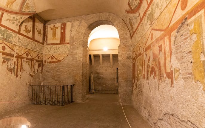Underground catacombs with ancient frescoes on a guided tour with transfers.