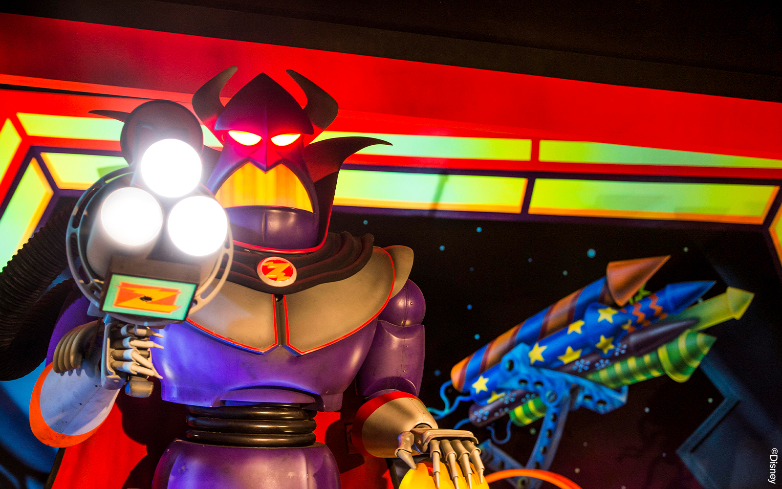 Buzz Lightyear Laser Blast ride at Disneyland Paris with colorful space-themed decor.