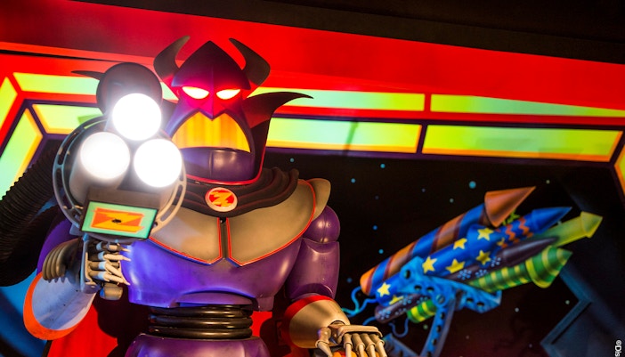 Buzz Lightyear Laser Blast ride at Disneyland Paris with colorful space-themed decor.
