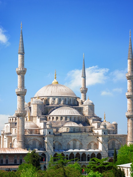 Blue Mosque with minarets against a clear sky in Istanbul, Turkey.