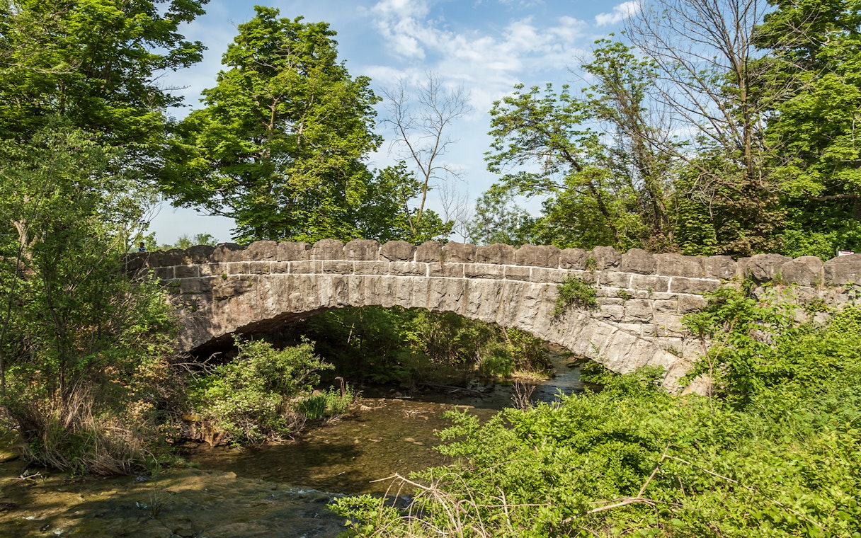 Stone bridge over a stream connecting Goat Island to Three Sisters Island, Niagara Falls State Park.