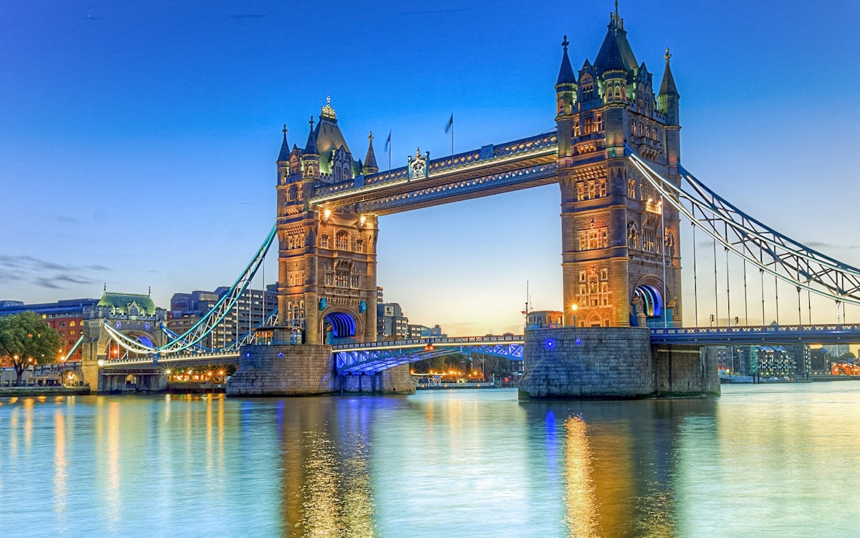 Tower Bridge over River Thames at sunset, London, part of Westminster to Greenwich cruise.