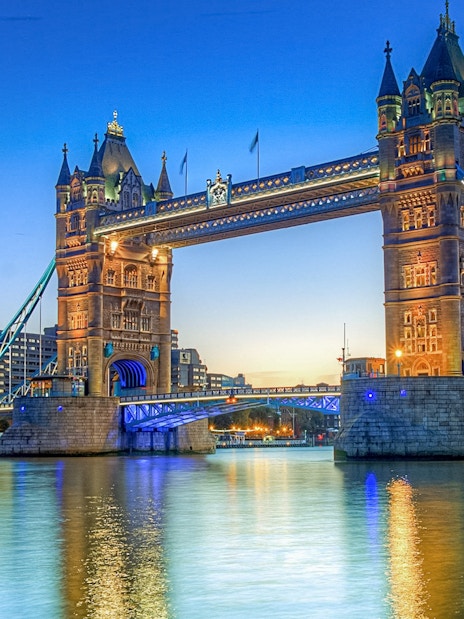 Tower Bridge over River Thames at sunset, London, part of Westminster to Greenwich cruise.