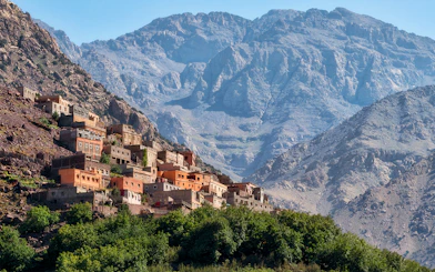 Village in the Ourika Valley with Atlas Mountains backdrop, near Marrakech.