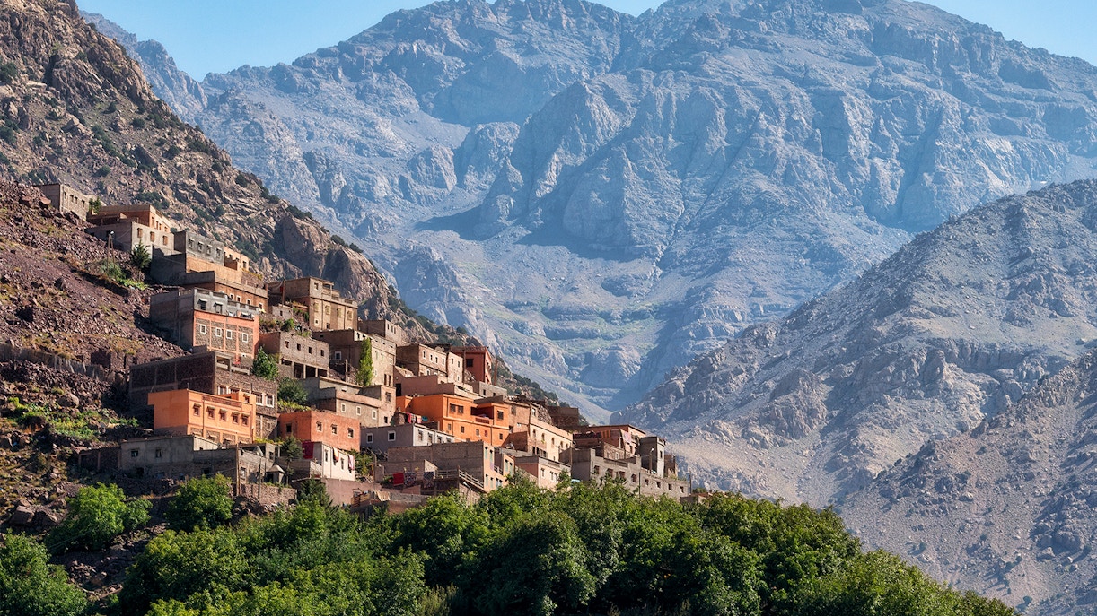 Village in the Ourika Valley with Atlas Mountains backdrop, near Marrakech.