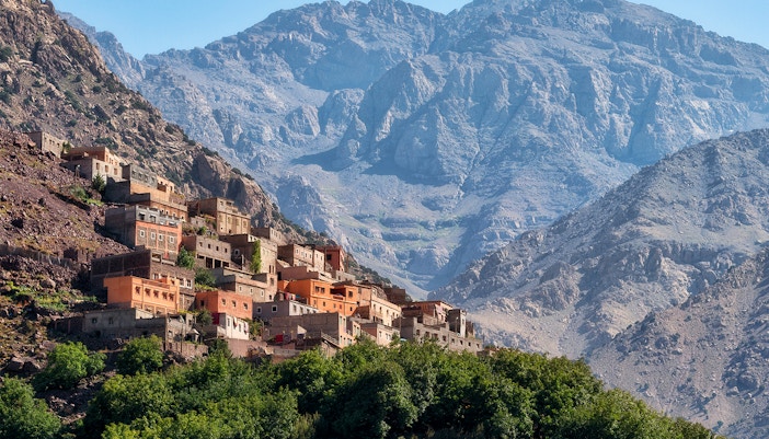 Village in the Ourika Valley with Atlas Mountains backdrop, near Marrakech.