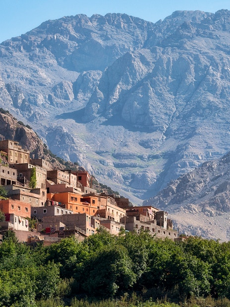 Village in the Ourika Valley with Atlas Mountains backdrop, near Marrakech.