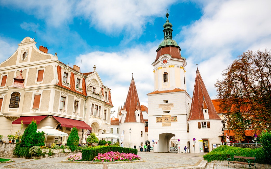 Historic buildings and clock tower in Melk, Austria, during Wachau day trip.