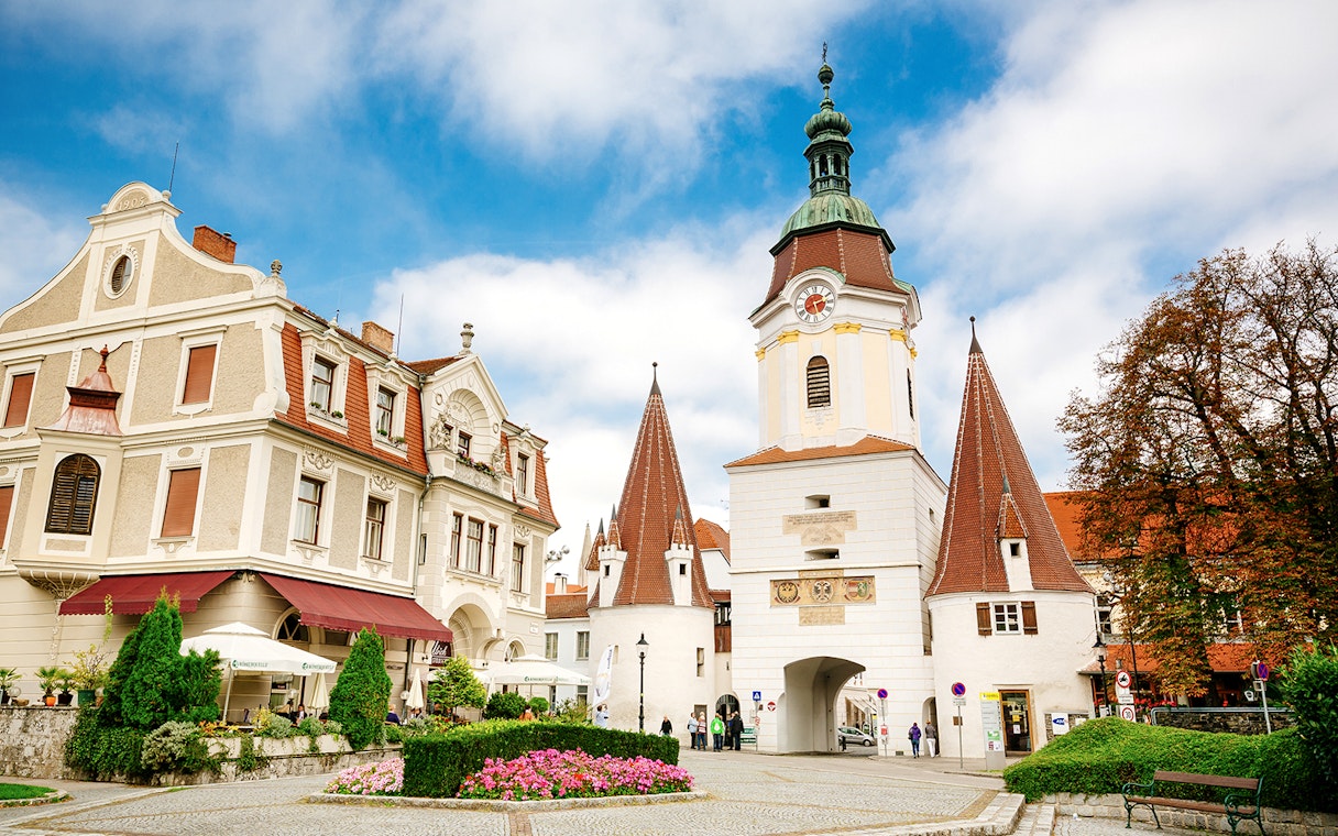 Historic buildings and clock tower in Melk, Austria, during Wachau day trip.