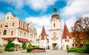Historic buildings and clock tower in Melk, Austria, during Wachau day trip.