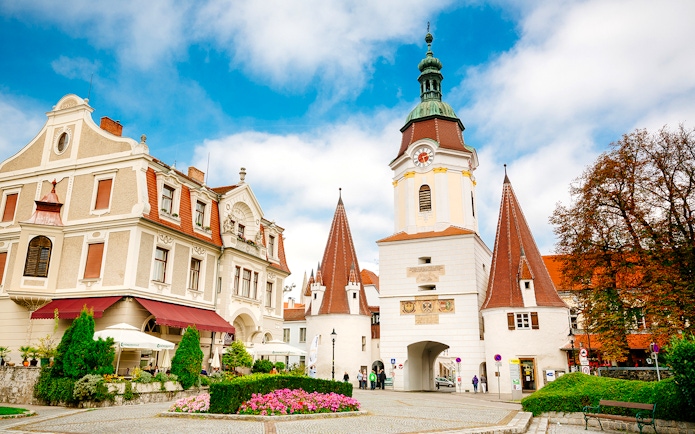 Historic buildings and clock tower in Melk, Austria, during Wachau day trip.
