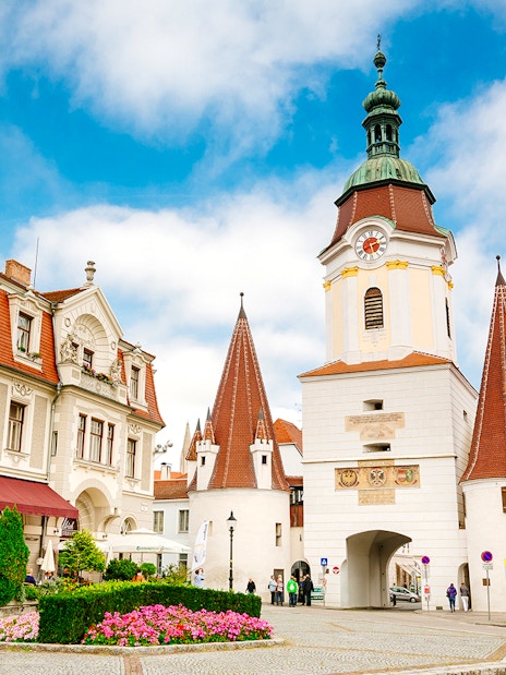 Historic buildings and clock tower in Melk, Austria, during Wachau day trip.