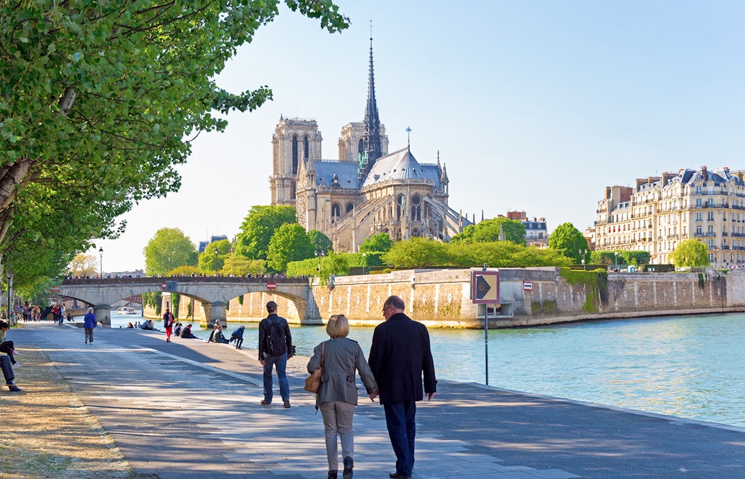 People walking around Notre Dame Cathedral