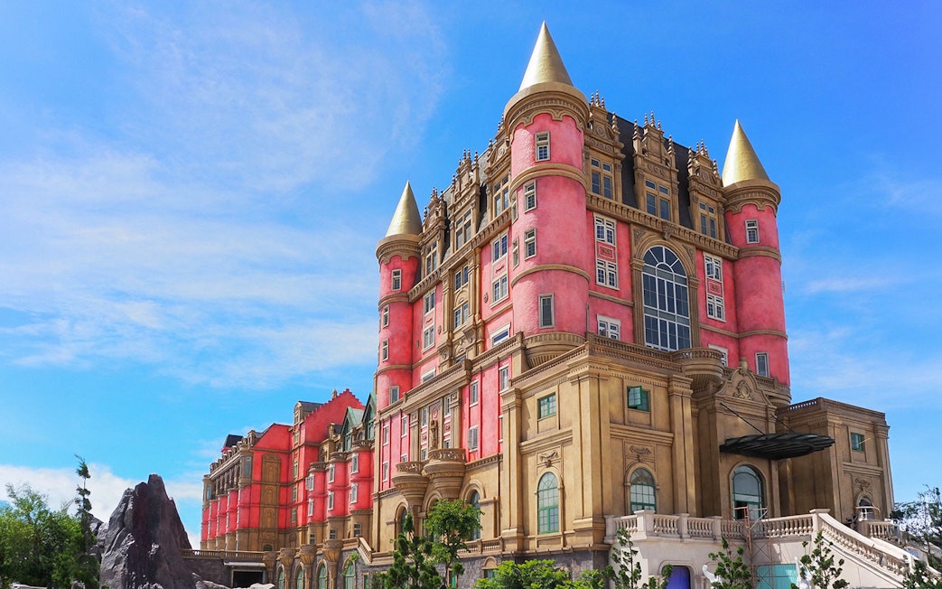 Luna Castle in Ba Na Hills, Da Nang, Vietnam with pink and gold towers.
