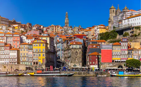 Colorful Ribeira district buildings along the Douro River in Porto, Portugal.