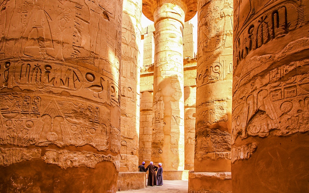 Karnak Temple columns with hieroglyphs, Luxor, Egypt.