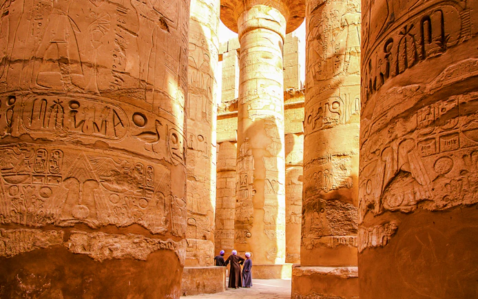 Karnak Temple columns with hieroglyphs, Luxor, Egypt.