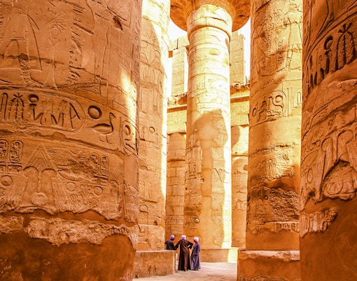 Karnak Temple columns with hieroglyphs, Luxor, Egypt.