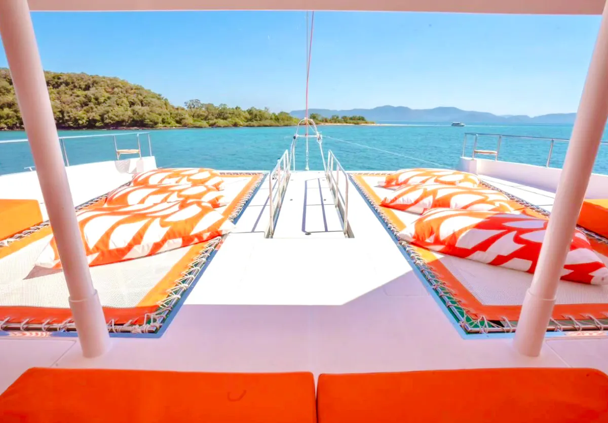 Luxury yacht deck with sun loungers, Pattaya 3-island cruise.
