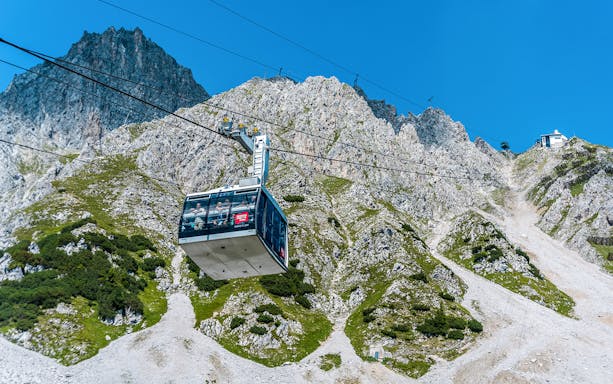 Cable car ascending Nordkette mountain in Innsbruck, Austria.