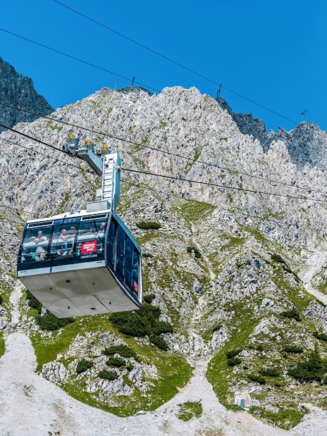 Cable car ascending Nordkette mountain in Innsbruck, Austria.