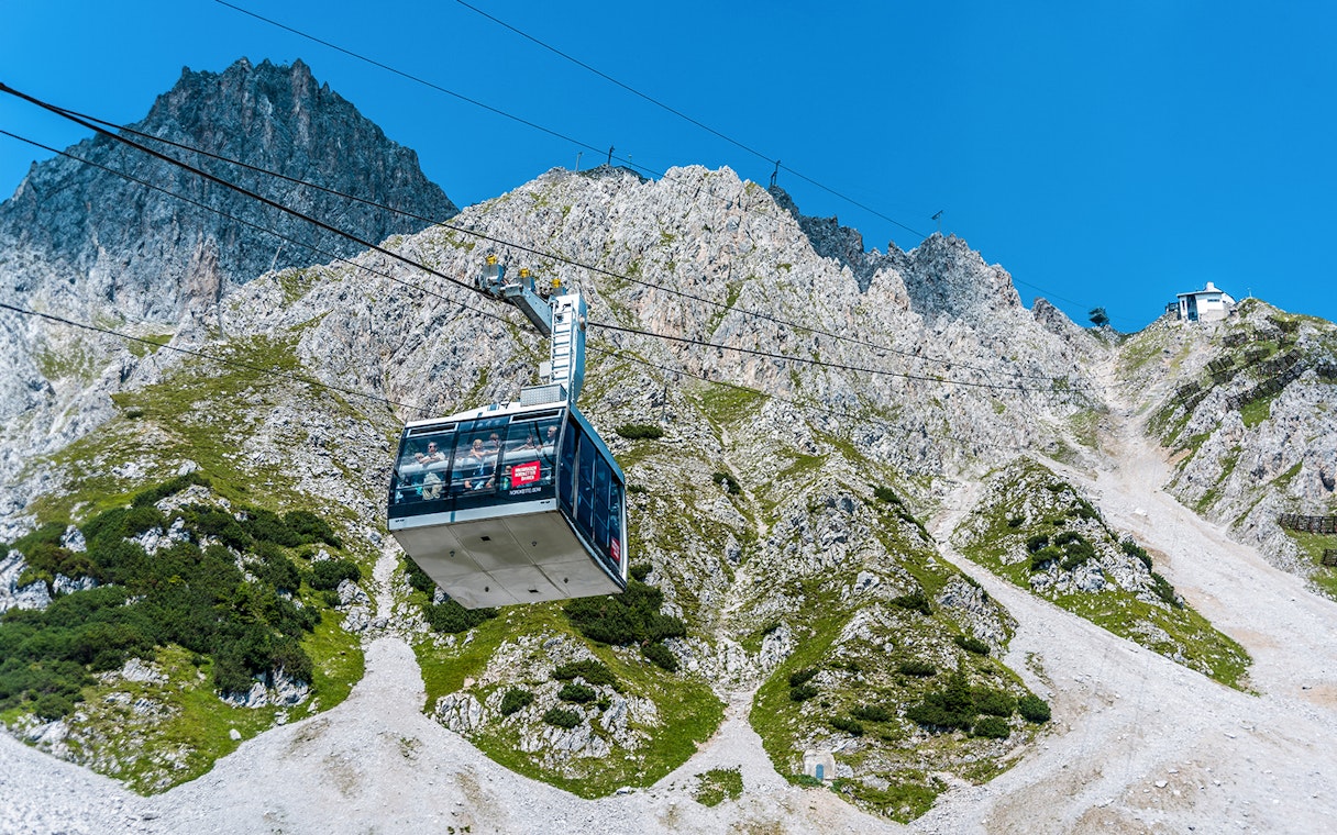 Cable car ascending Nordkette mountain in Innsbruck, Austria.