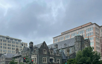 Historic stone building in Washington DC, part of the self-guided city exploration game.