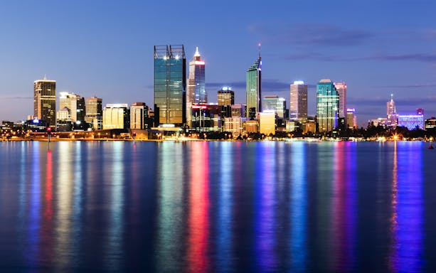 Skyline of Perth at night viewed from Swan River Dinner Cruise.