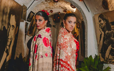 Flamenco dancers in traditional attire at Venta el Gallo, Flamenco Show.
