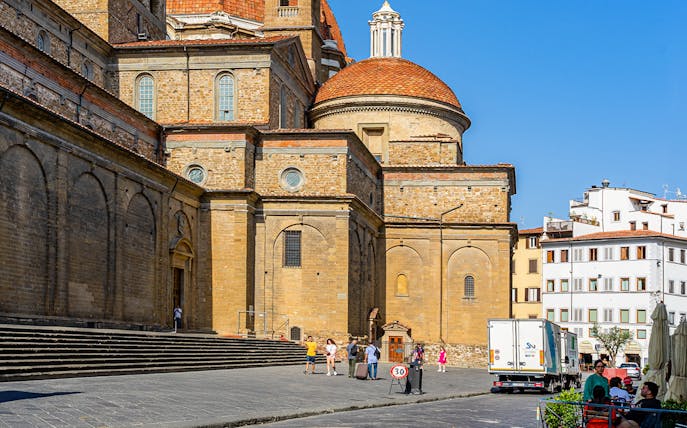San Lorenzo Basilica exterior with visitors at San Lorenzo Square, Florence.
