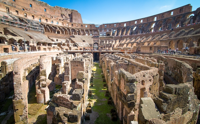 Colosseum underground ruins with ancient stone structures in Rome, Italy.