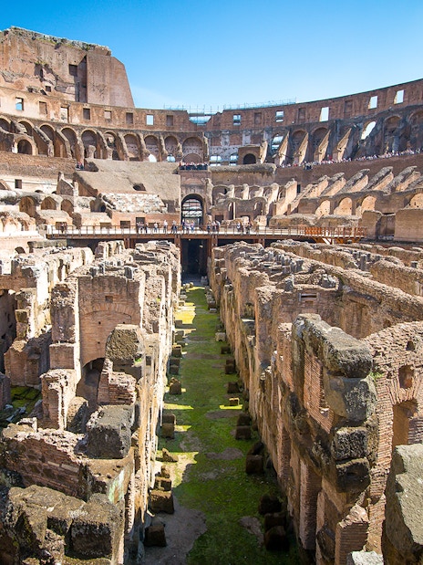 Colosseum underground ruins with ancient stone structures in Rome, Italy.