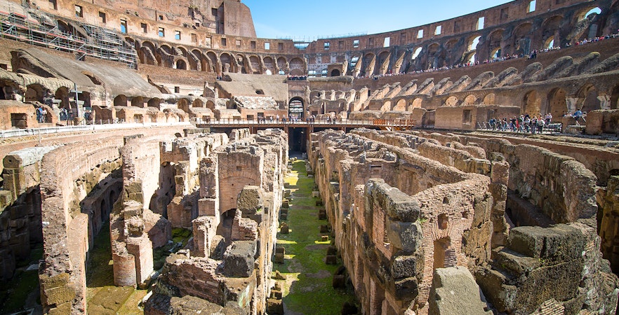 Colosseum underground ruins with ancient stone structures in Rome, Italy.
