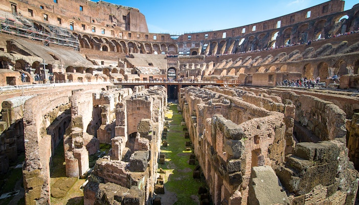 Colosseum underground ruins with ancient stone structures in Rome, Italy.