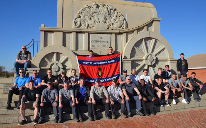 Group at historical monument in Durban during shared tour experience.
