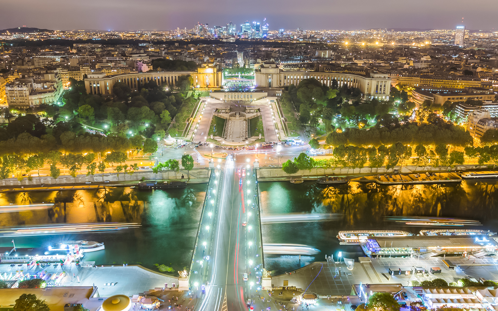 Aerial view of Trocadéro Gardens and Seine River at night, Paris.
