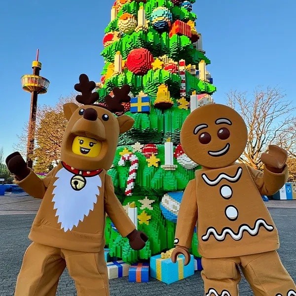 Gingerbread Man and reindeer costume at LEGO Christmas tree, LEGOLAND® Billund.