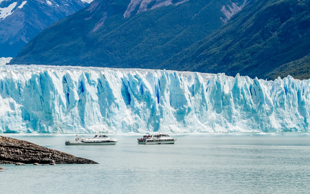 Cruise boats in front of Perito Moreno Glacier, Argentina.