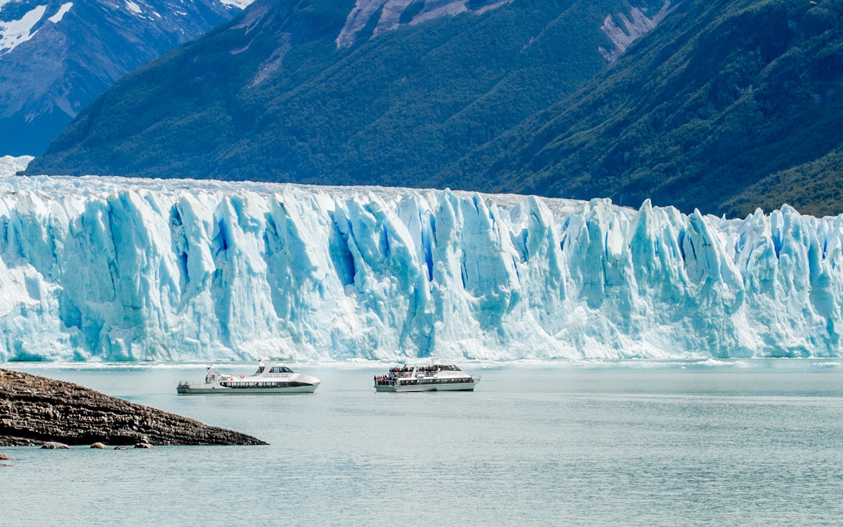 Cruise boats in front of Perito Moreno Glacier, Argentina.