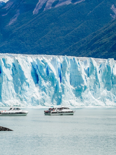 Cruise boats in front of Perito Moreno Glacier, Argentina.
