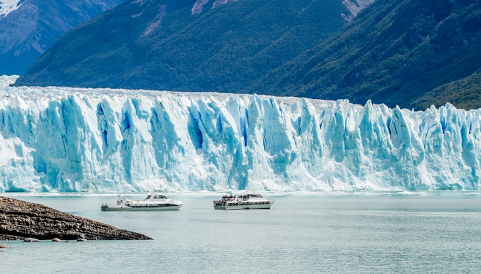 Cruise boats in front of Perito Moreno Glacier, Argentina.