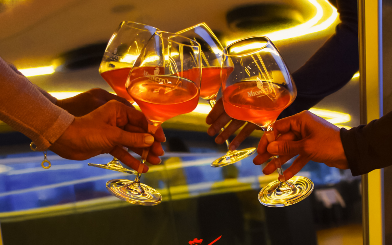 Toasting with Prosecco glasses on a 90-minute sightseeing cruise.