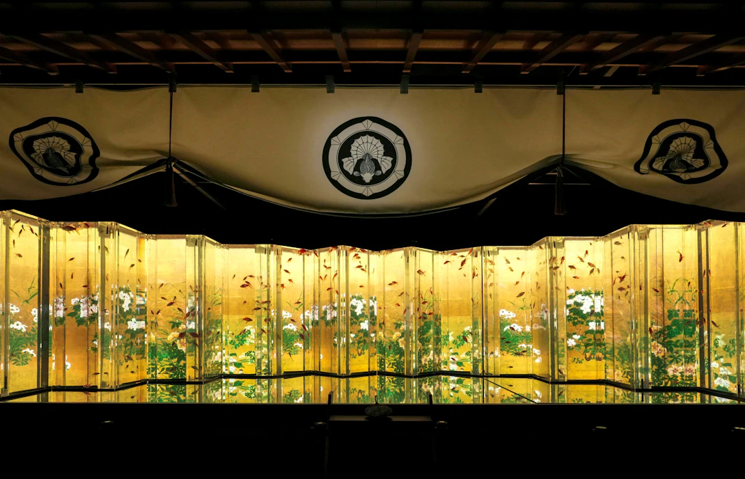 Goldfish swimming in illuminated tanks at Art Aquarium Museum GINZA.