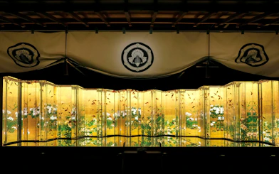 Goldfish swimming in illuminated tanks at Art Aquarium Museum GINZA.