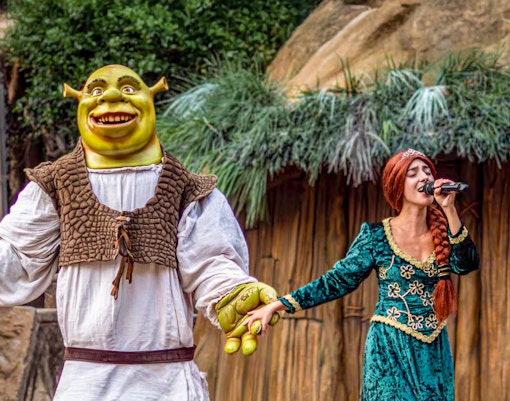 Shrek character greeting visitors at Port Aventura theme park in Spain.