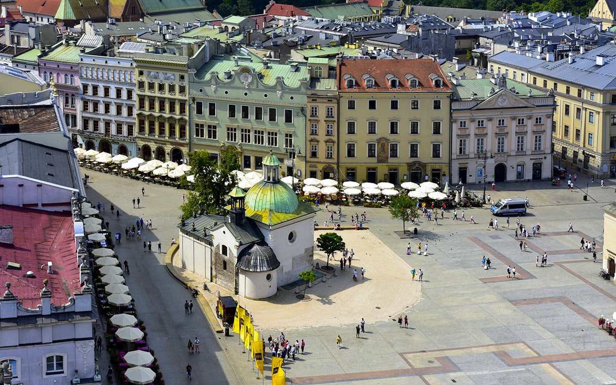 Aerial view of Kraków's Main Square with St. Adalbert's Church and surrounding historic buildings.
