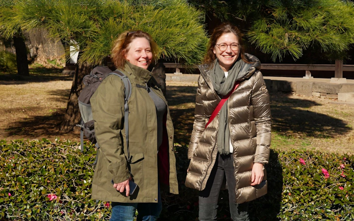Visitors enjoying a sunny day at the Imperial Palace Gardens, Tokyo.